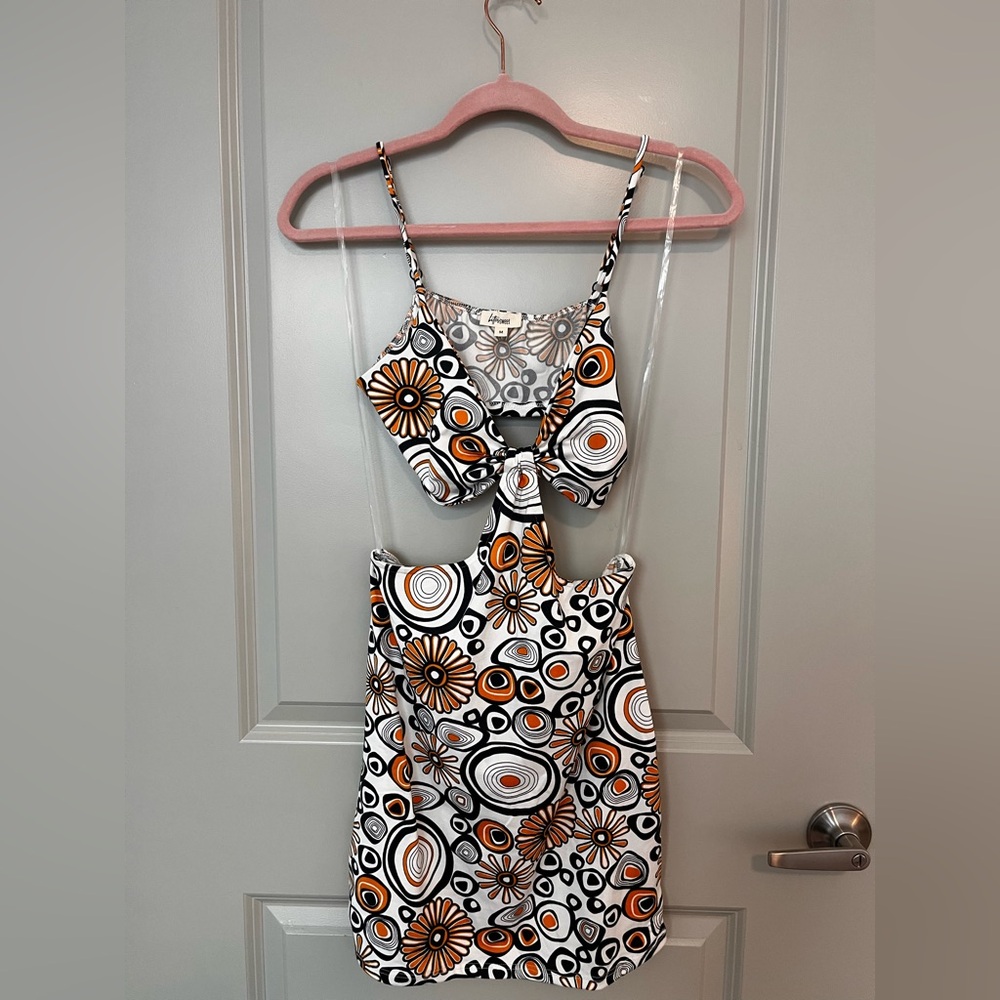 Retro Patterned Dress with Orange and Black Accents